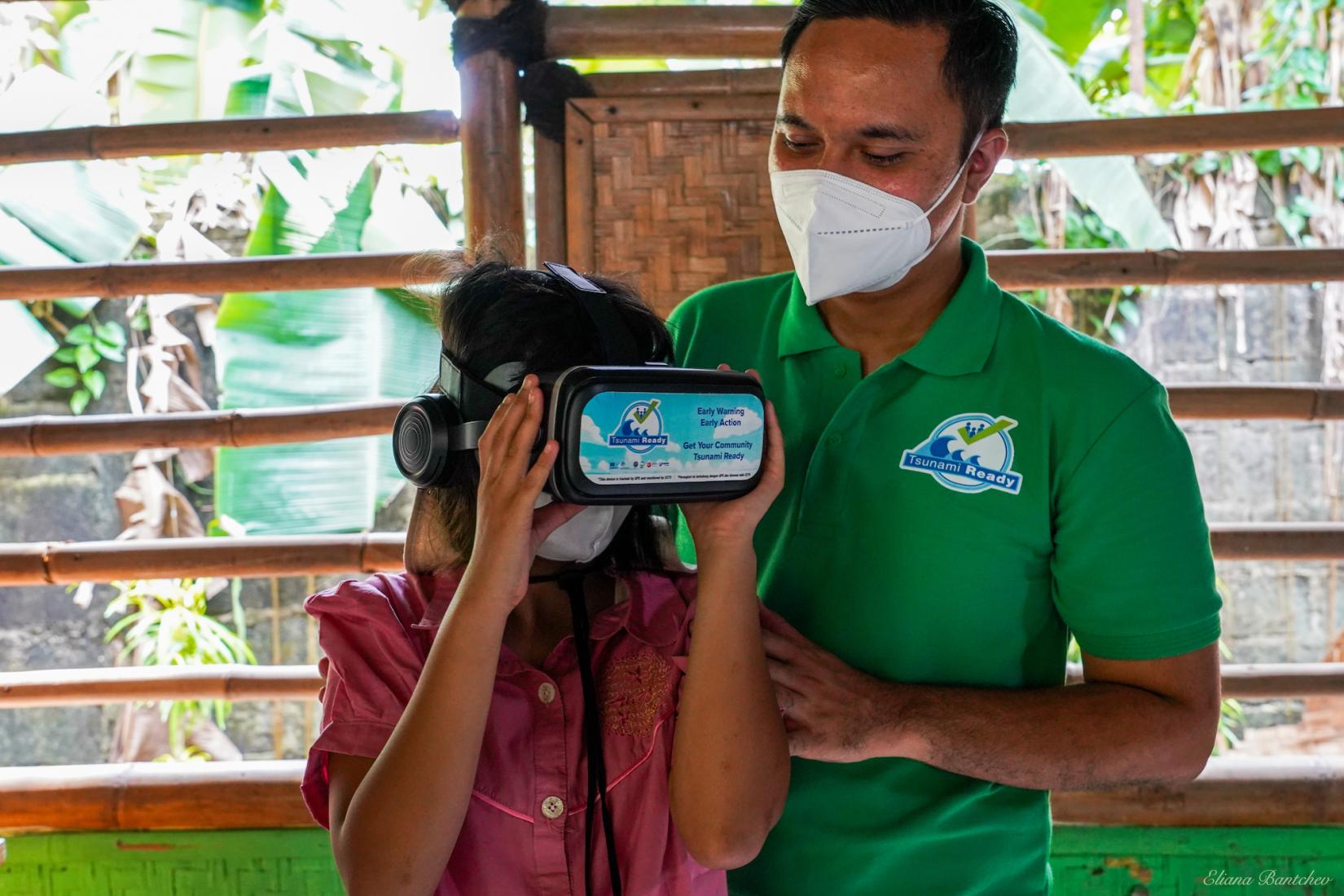 A student watches a UNESCO virtual reality simulation designed to promote tsunami readiness at Sekolah Alam Matoa in West Java, on June 16, 2022
