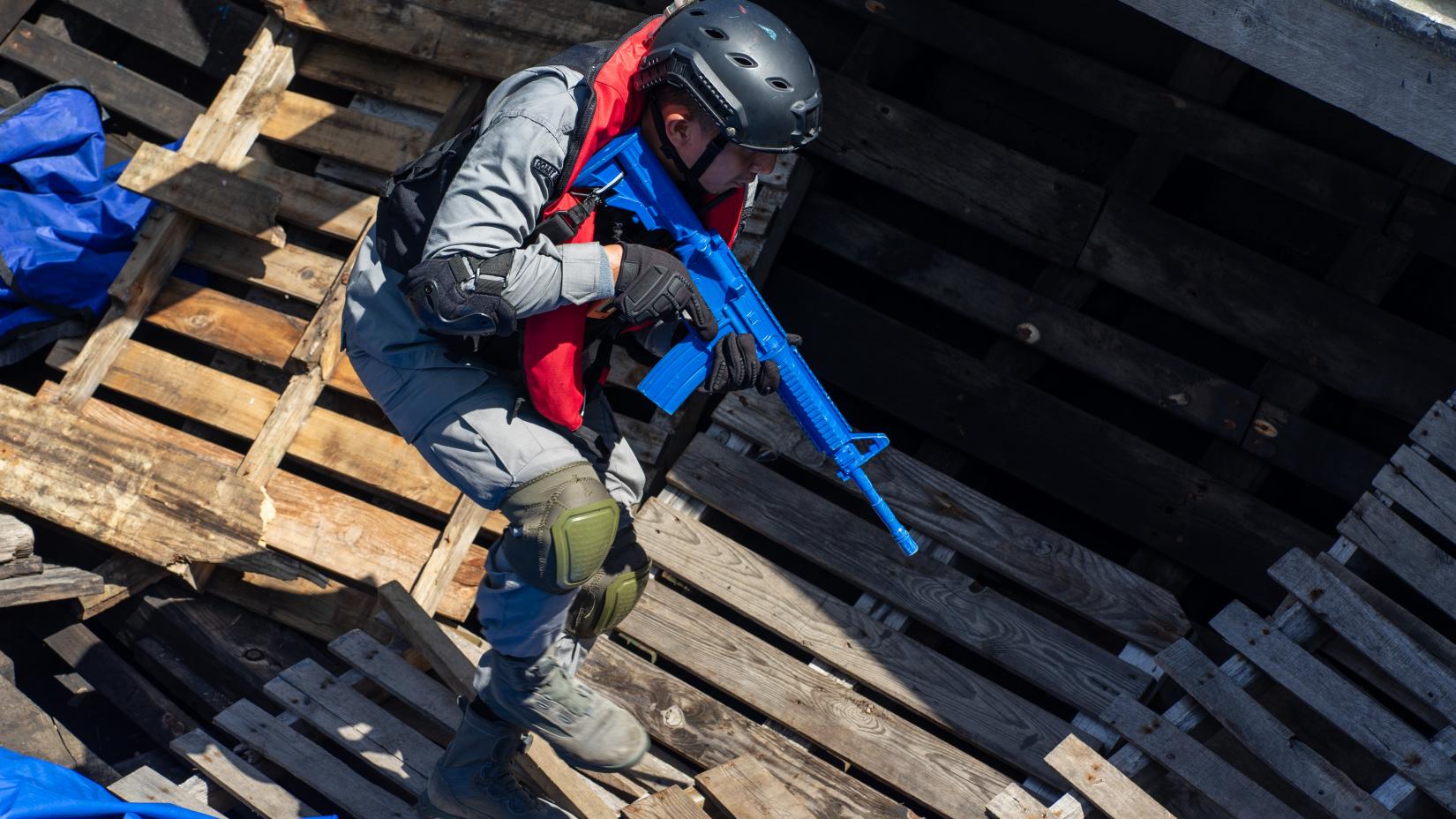 Officers from Indonesia’s Coast Guard (BAKAMLA) take part in an exercise at the Visit, Board, Search, and Seizure training facility in Batam, Indonesia, on June 15, 2023. Credit: Joseph Hincks