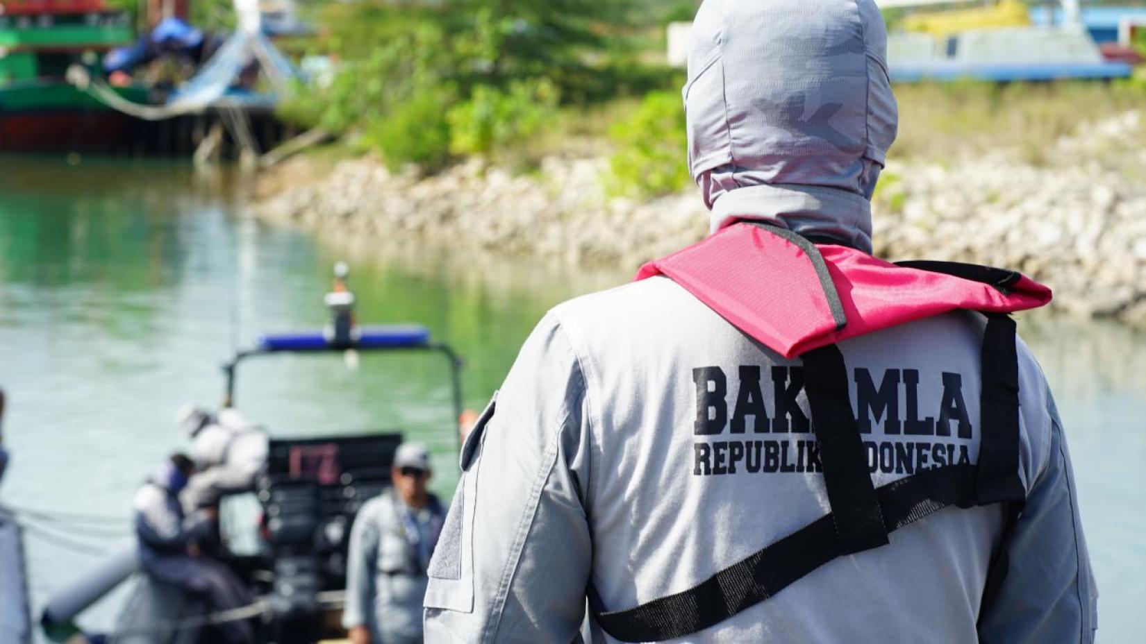 Officers from Indonesia’s Coast Guard (BAKAMLA) take part in an exercise at the Visit, Board, Search, and Seizure training facility in Batam, Indonesia, on June 15, 2023