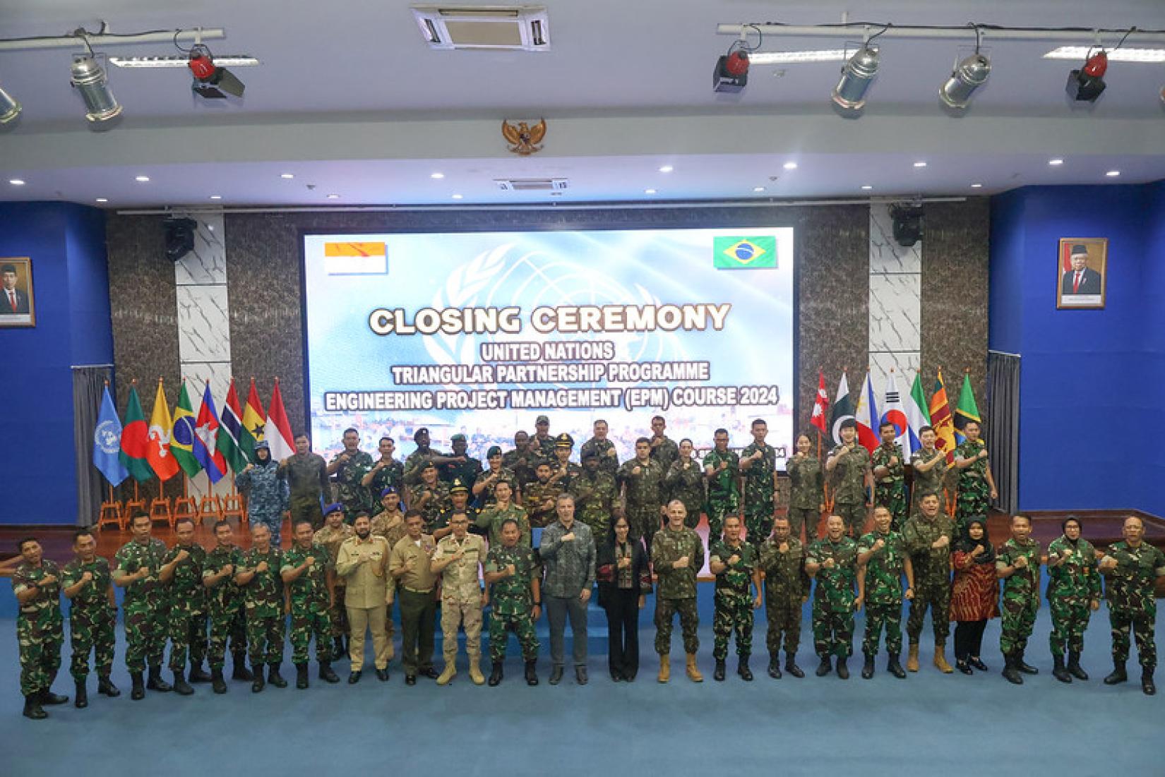 Participants and instructors gather for a group photo