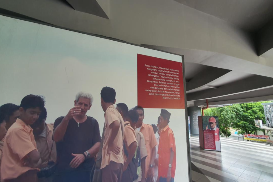 One of the documentations from Aceh Tsunami depicting a foreign man surrounded by local students is showcased at the Aceh Tsunami Museum.
