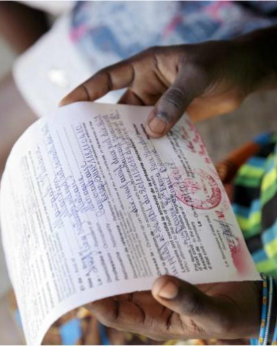 Left: In Montenegro, a program brings social services to vulnerable populations. Middle: A mother displays a birth certificate required for her daughter's education, Cameroon. Right: A health worker explaining handwashing technique to a woman, India.